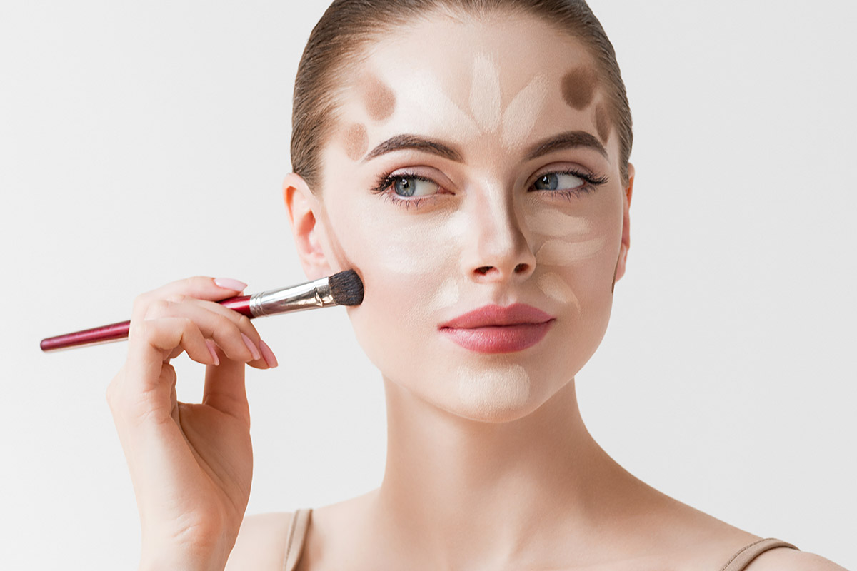 Closeup woman face. Contour Highlight makeup sample. Professiona
